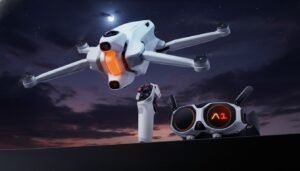 Anti-Gravity A1 drone with dual 360-degree lenses, compact foldable body, vision goggles, and motion controller arranged with accessories.